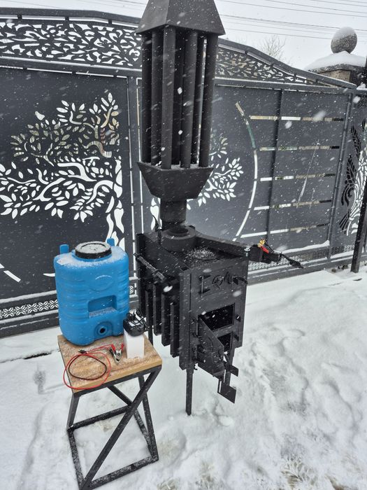 Піч буржуйка з радіатором та пальником на відпрацьованому мастилі