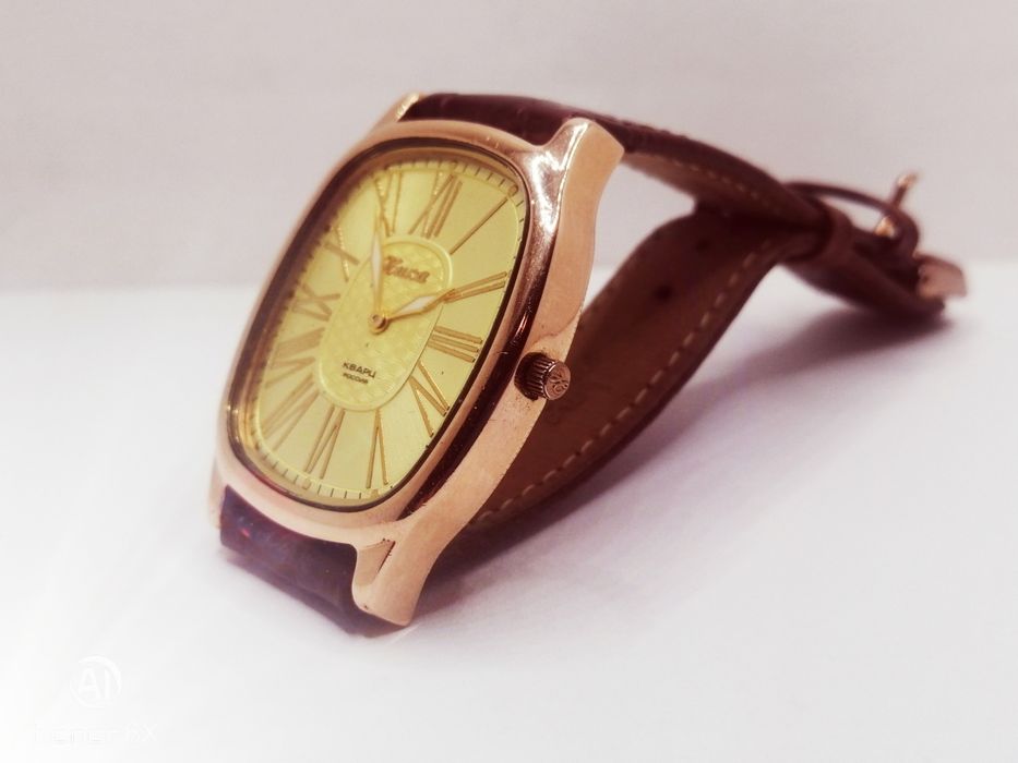 Золотые часы Ника