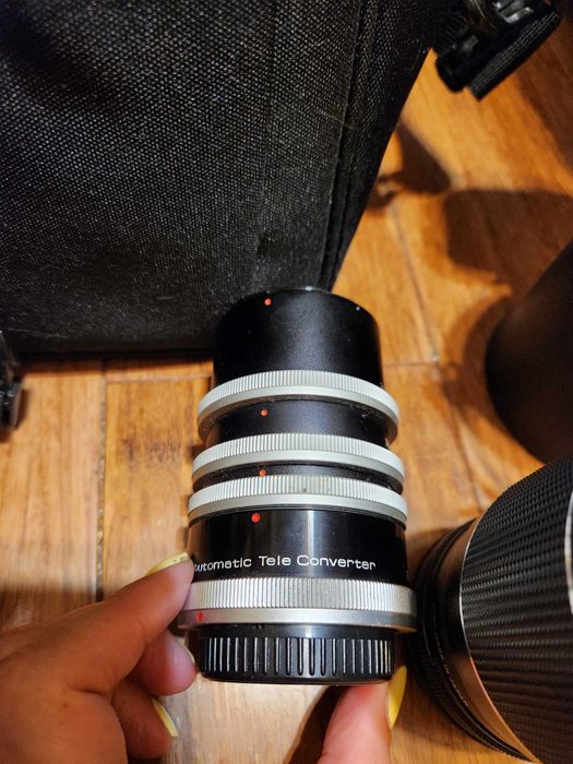 Zestaw aparat Canon A1, obiektyw, komplet konwerterów i torba