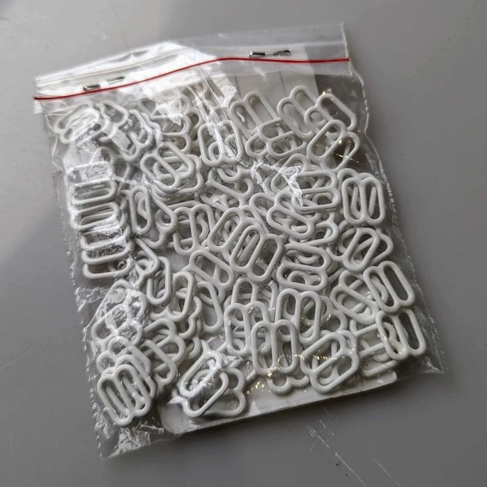 Metalowe regulatory do bielizny (11mm) - opakowanie 100szt.