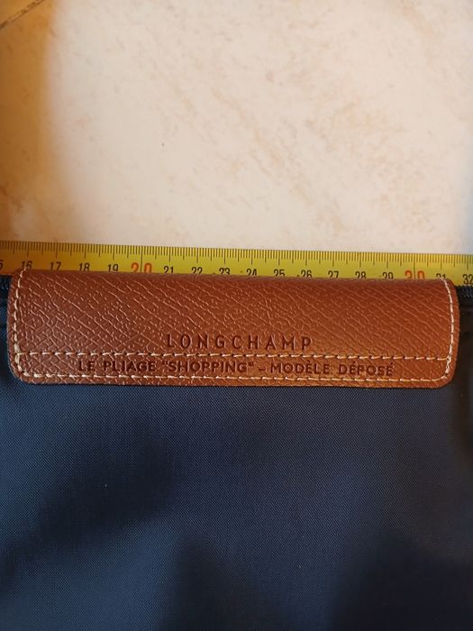 Longchamp como Nova