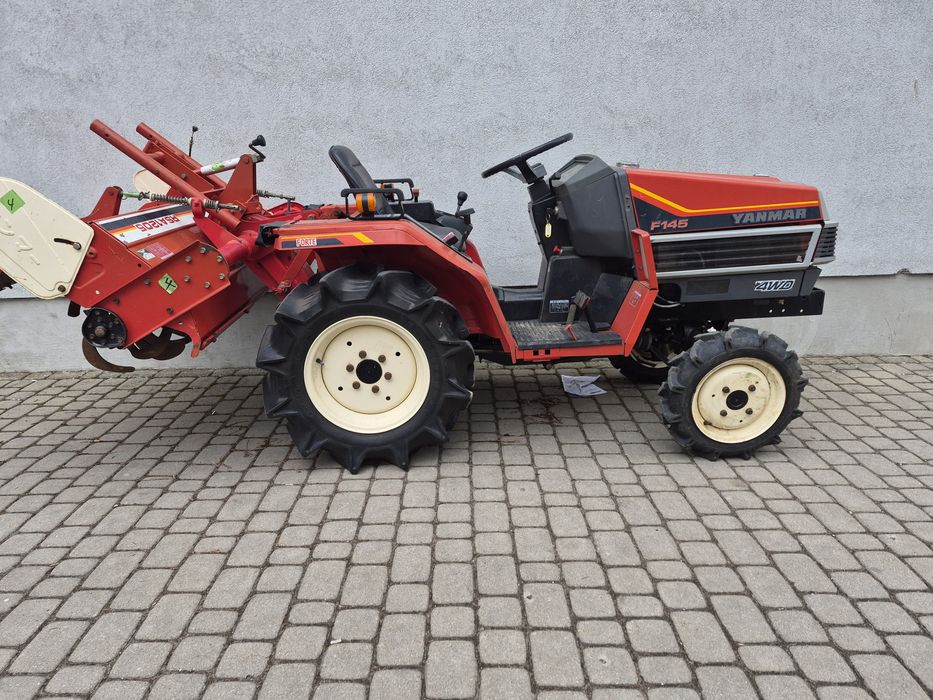 Yanmar z glebogryzarką iseki ładowacz kubota