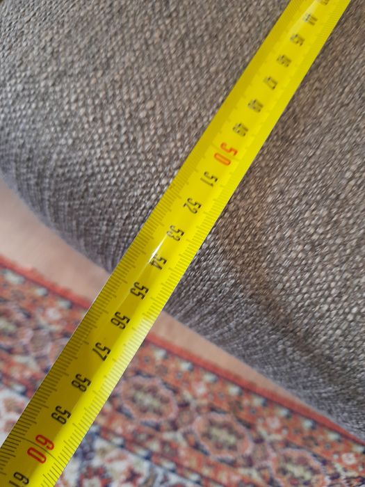 Sofá em tecido novo, cor cinza nunca usado.
