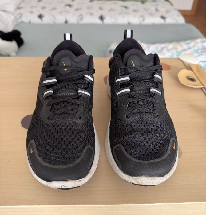Nike React Infinity Run preto/dourado 38
