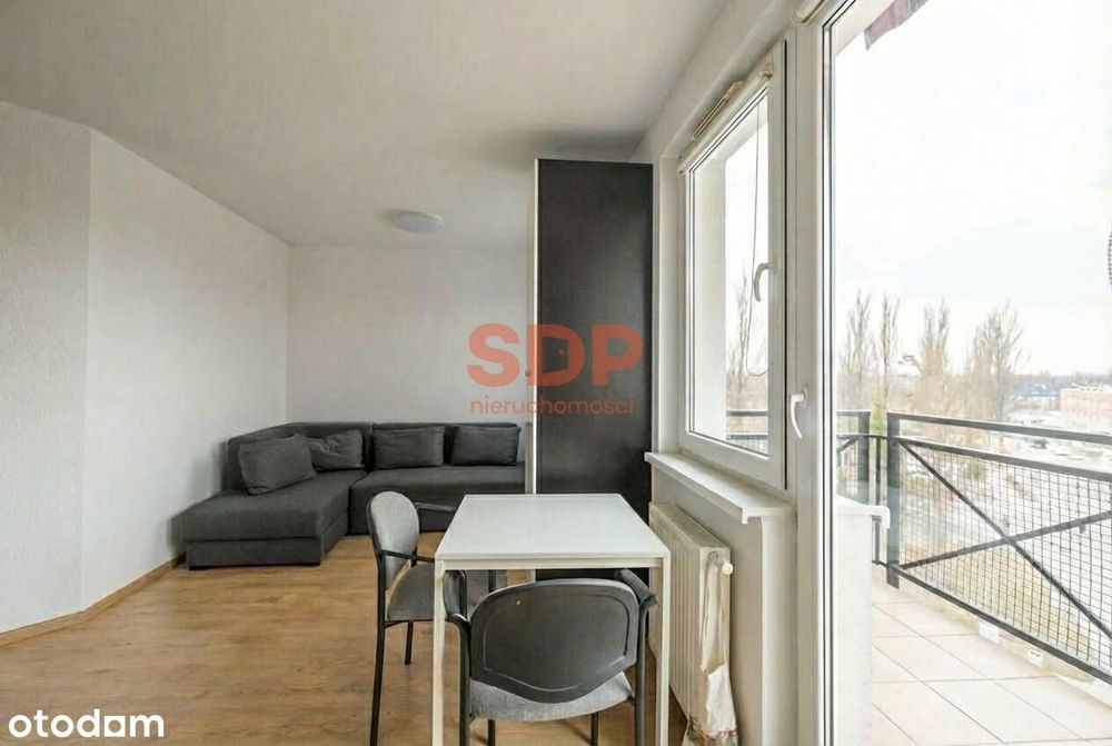 2 pokoje, balkon, winda