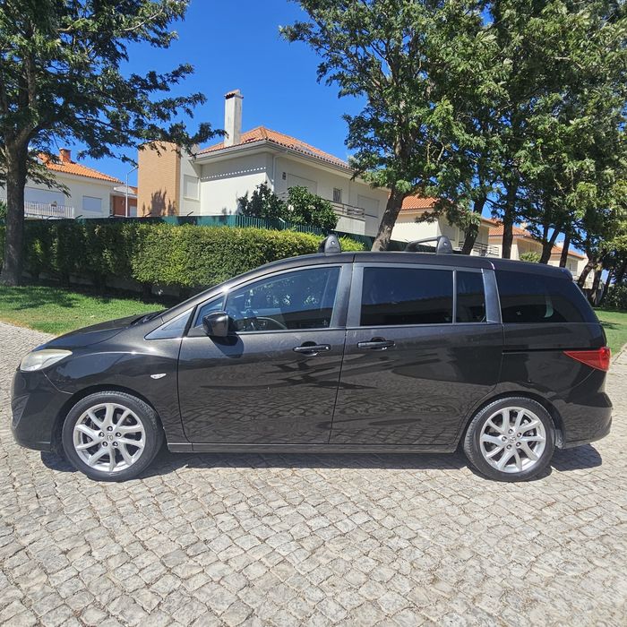 Vendo masda 5 de 2011 de 7 lugares com apenas 163 mil km esta rigorosamente impecável