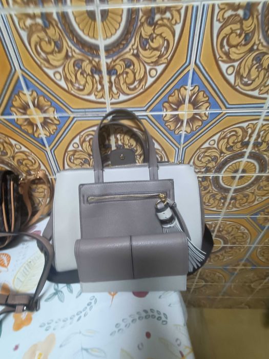 Vendo Malas e Carteiras