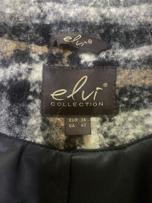 Стильне пальто в клітинку, актуальне на осінній сезон