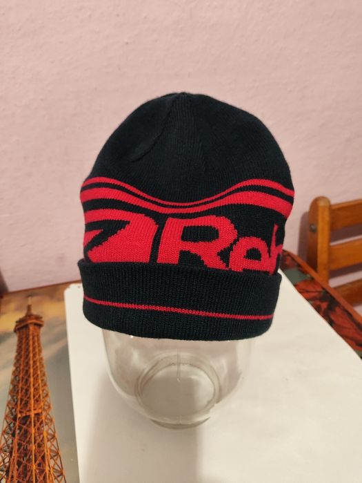 Двостороння шапка бренду REHALL