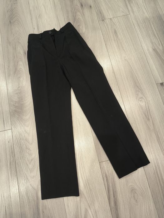 Materiałowe spodnie eleganckie dla chłopca rozmiar 140/146