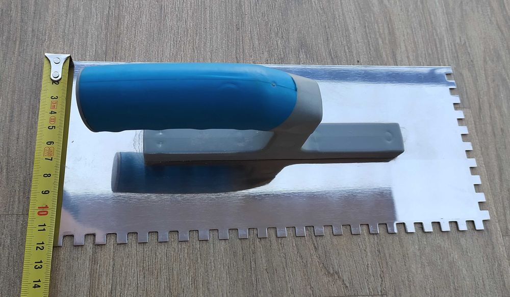 Гладилка з нержавіючої сталі 120x280 мм .