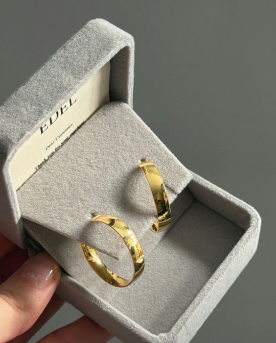 Сережки Edel золоті  750 проба нові 4.44грам