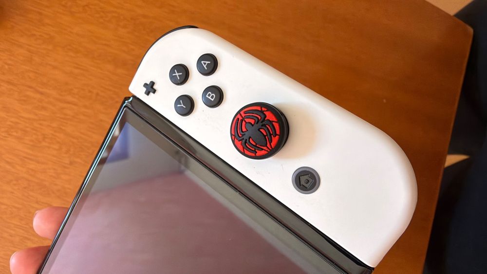 Nintendo Switch OLED – Como Nova