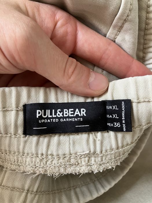 spodnie joggery chinosy męskie beżowe pull&bear