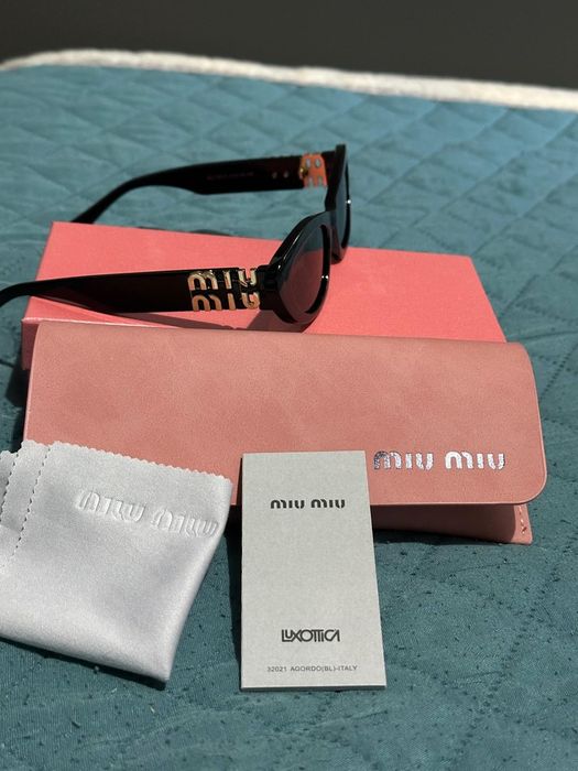 Oculos de sol com caixa