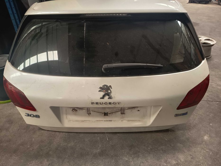 Tampa mala Peugeot 308 ano 2015