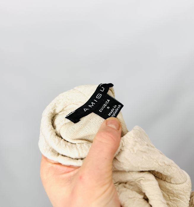 Kremowa bluzka z wysoką stójką S 36