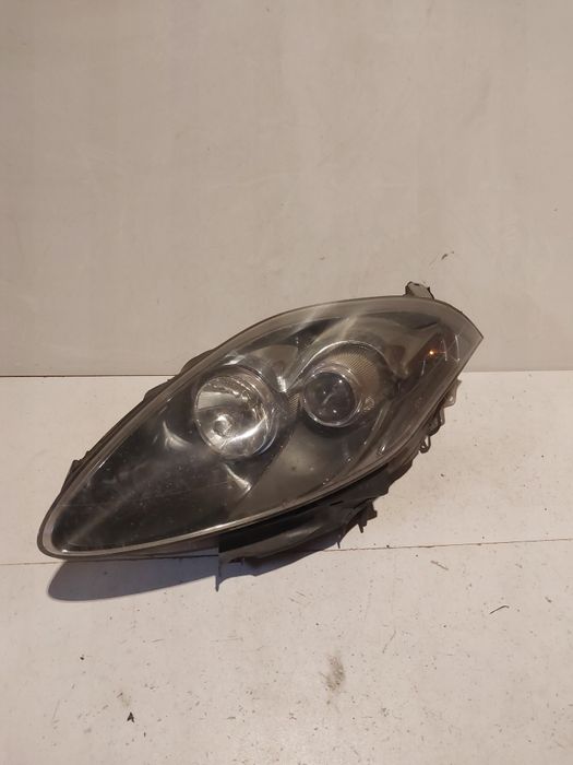 Fiat Bravo II 2 lewa lampa przednia przód reflektor lewy przedni