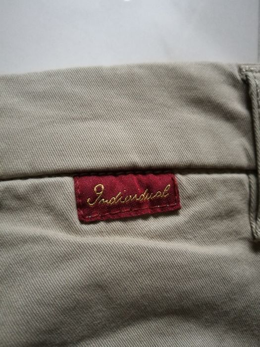 Spodnie Indywidual rozmiar 36W-32L, 97% bawełna. Slim fit.