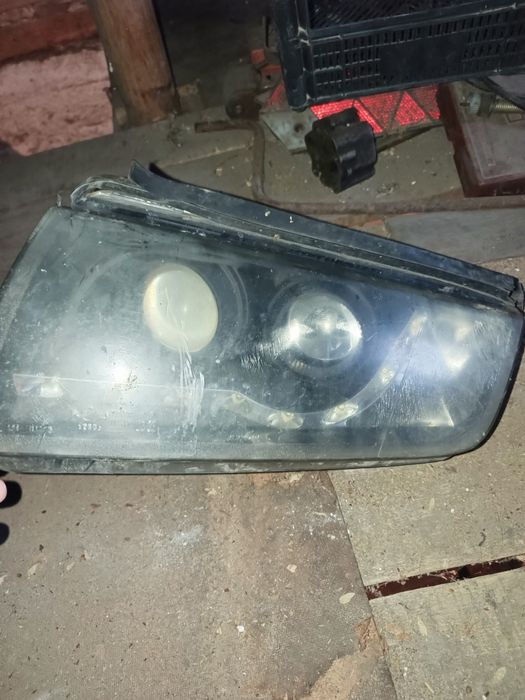 Фара з лінзою шкода фабія