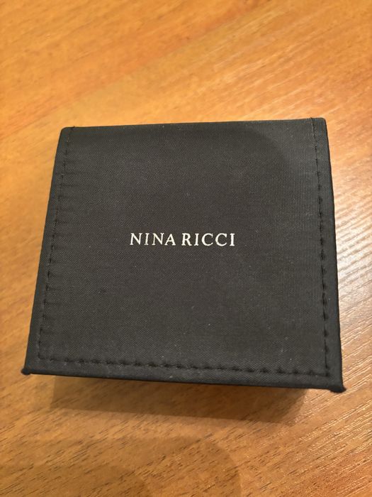 Чоловічі запонки Nina Ricci.