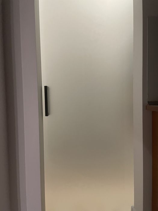 Sprzedam szklane na prowadnicach drzwi