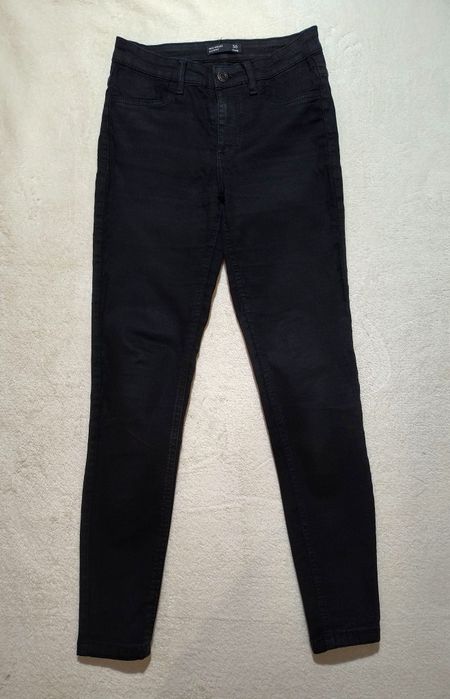 Czarne skinny jeansy spodnie ze średnim stanem