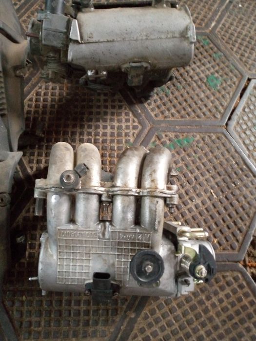 Коллектор впускной  таврия славута сенс. Инжектор  славута сенс ланос