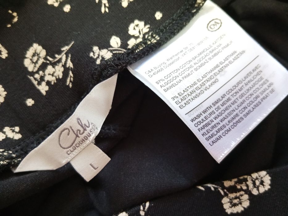 Saia curta preta e branca flores tamanho L