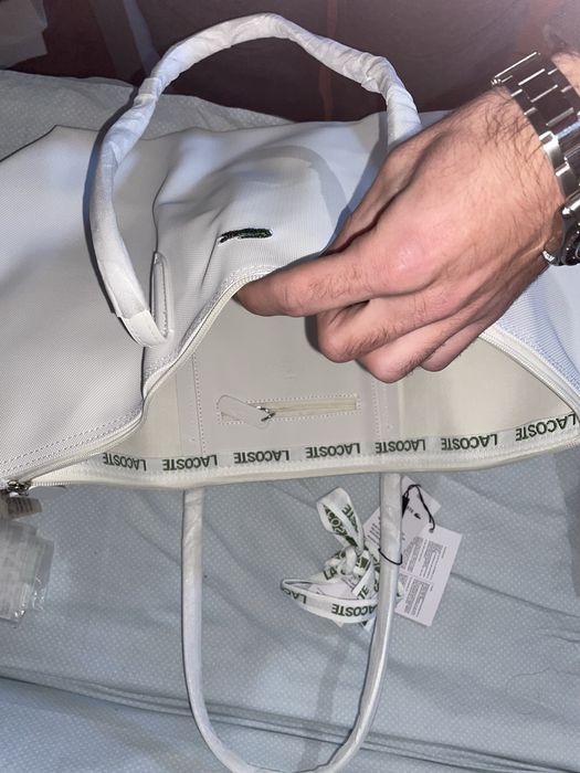 Malas mulher Lacoste