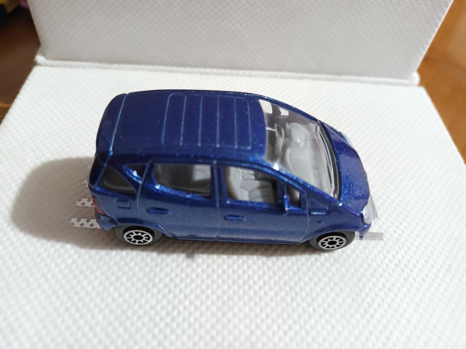 Miniaturas 1/64 Welly CM3