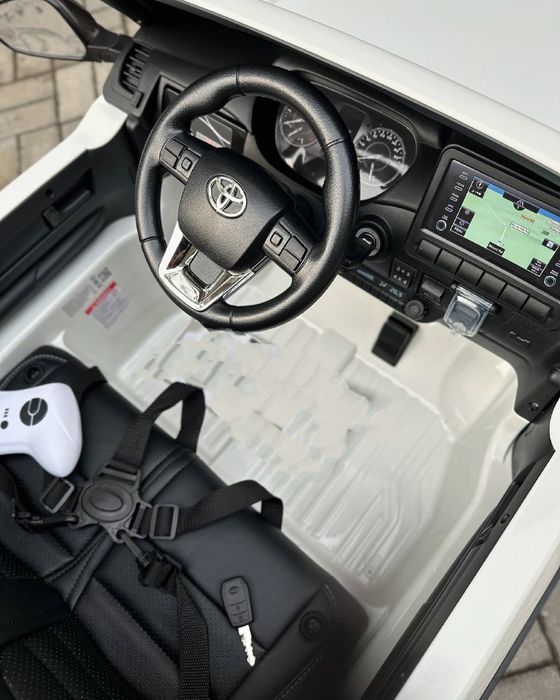 Детский электромобиль Toyota Hilux Двухместный дитячий електромобіль