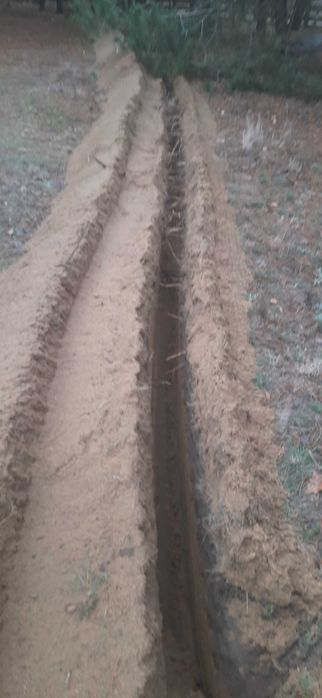 Usługi Koparką Łańcuchową, do 1m ,przyłącza wodne,prądowe,światłowody