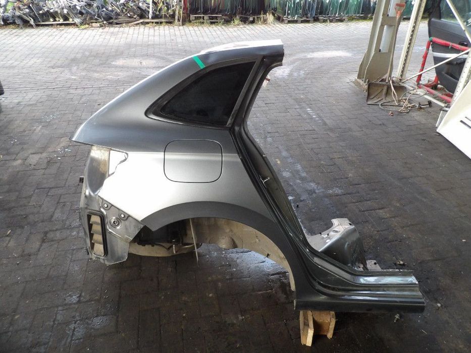 SKODA SCALA BŁOTNIK TYŁ PRAWY  F7C