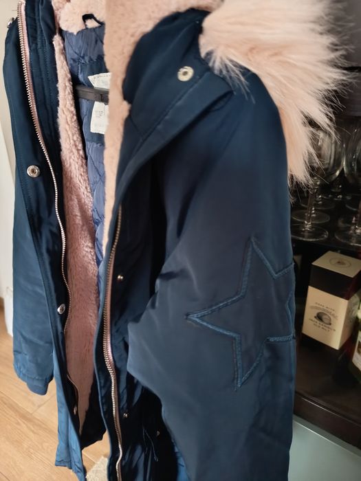 Fotos casaco impermeável com gorro pelúcia