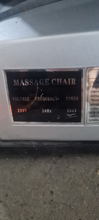 Fotel masujący. Kolor brązowy. Sprawny