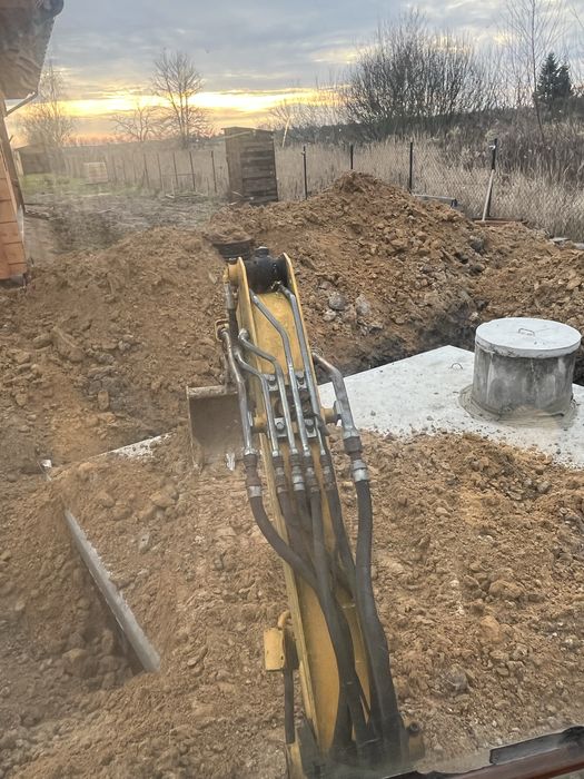 Uslugi minikoparka , koparka ,  kopanie fundamety , szamba .