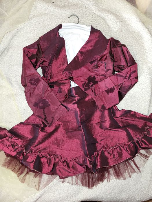 Гарні костюми на дівчинку на 8-11 років