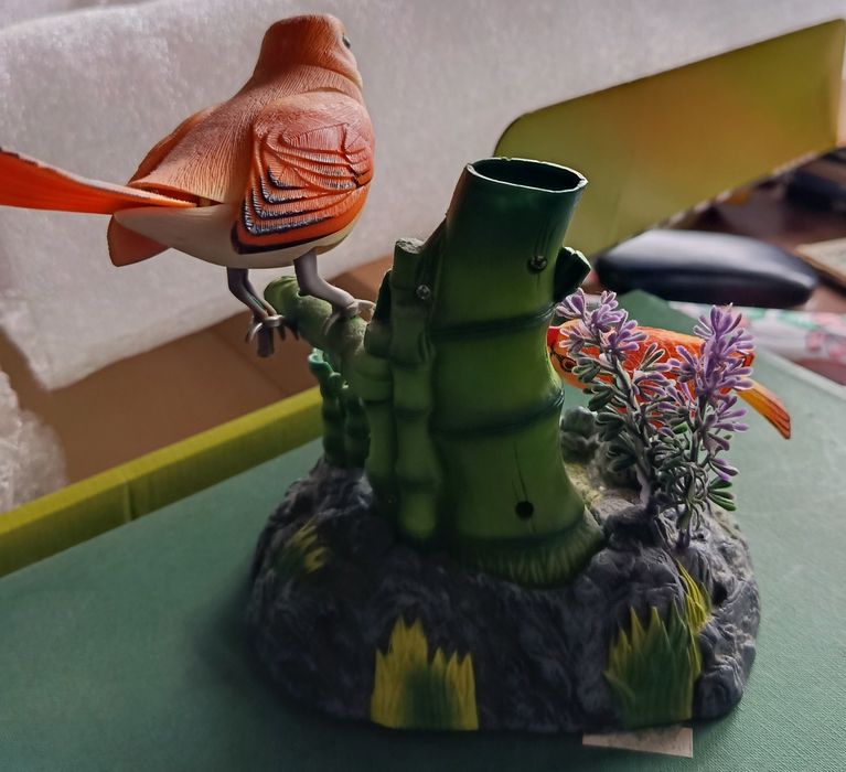 Peça decorativa com pássaros