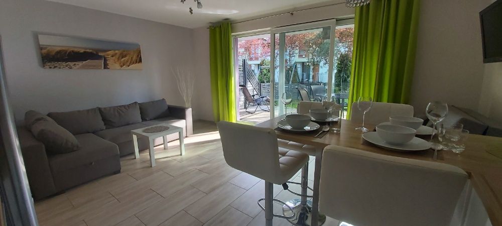 Pobierowo  Apartament 7 z tarasem i ogrodem. Huśtawka