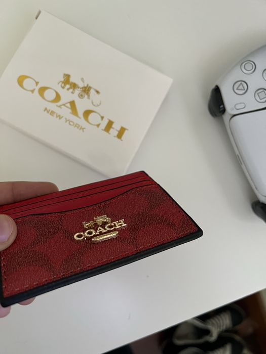 Carteira Coach comi novo