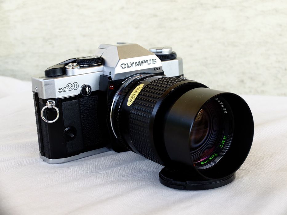 Olympus OM 20 winder 2 plus obiektywy statyw