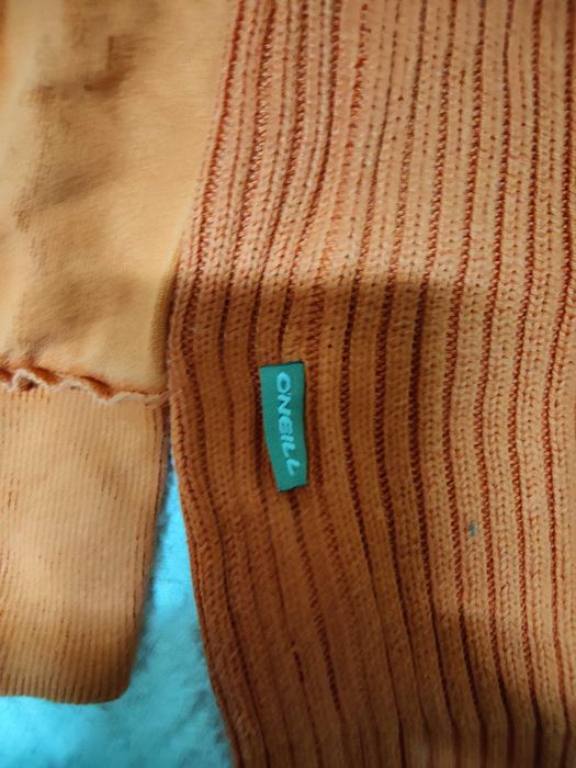 Casaco O'Neil tam.  M em bom estado