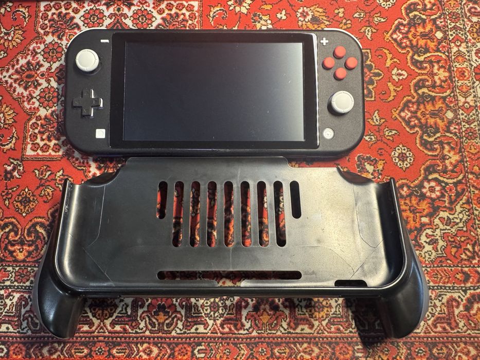 Nintendo Lite стан нової(в плівці) + чохол