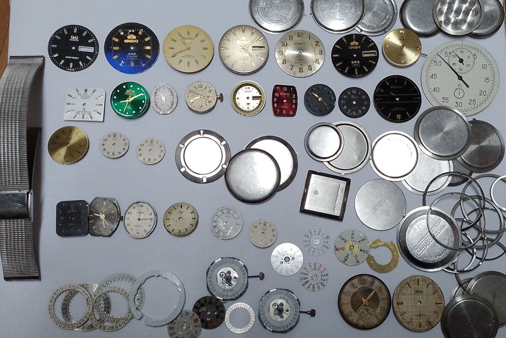 Циферблати та запчастини