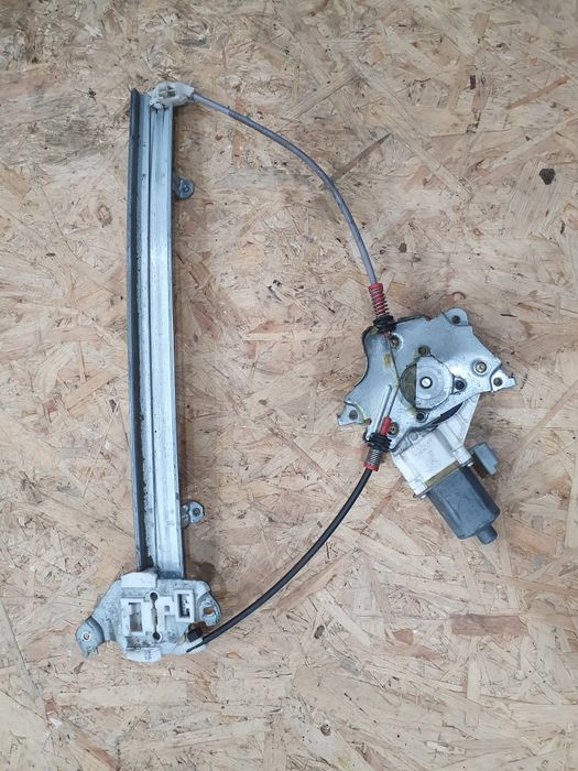 Mechanizm szyby silniczek lewy Nissan Micra k12 04r 3 drzwi