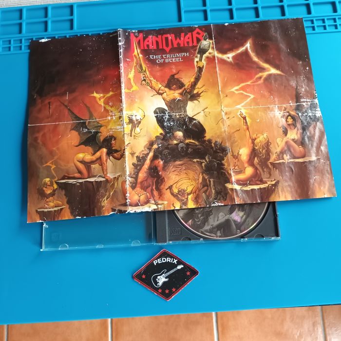 Manowar > The triumph of steel > ver fotos,descrição