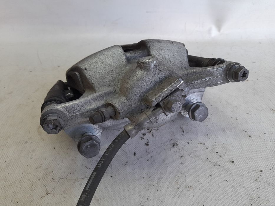 Pinça travão / maxila de travão frente esquerda SEAT Leon (5F1)