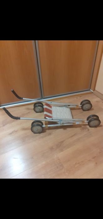 Дитяча іграшкова коляска