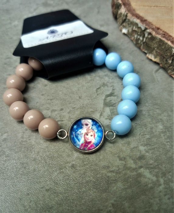 Bransoletka dla dziewczynki Elsa i Anna śnieżynki niebiesko beżowa